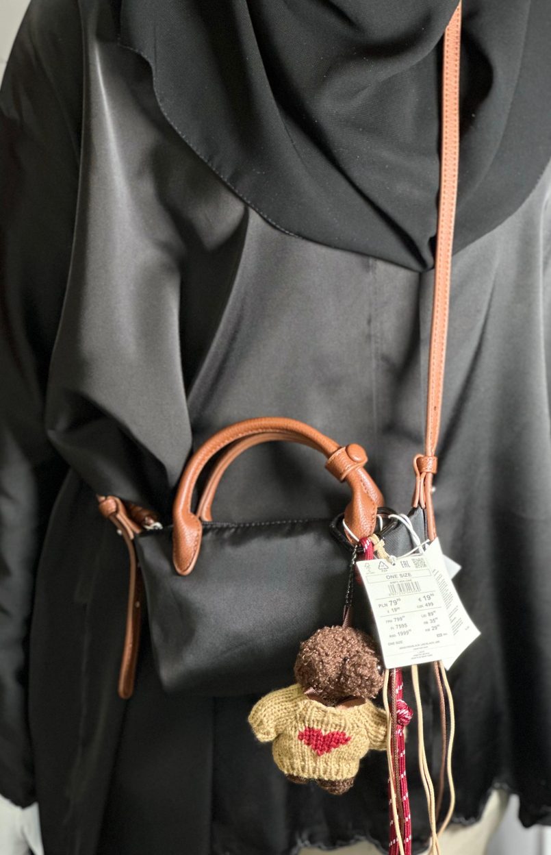 Reserved bag with charm