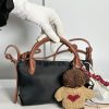 Reserved bag with charm